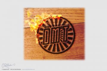 OMT Events Logo Design - Branded in Wood on Fire